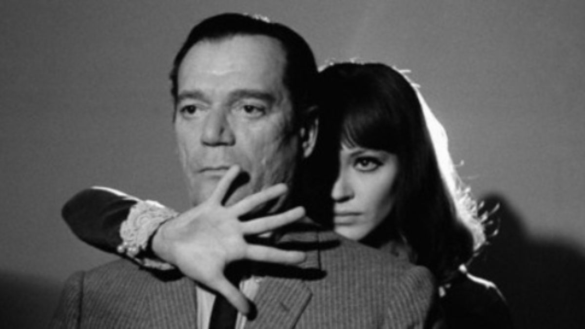 Eddie Constantine and Anna Karina in Alphaville